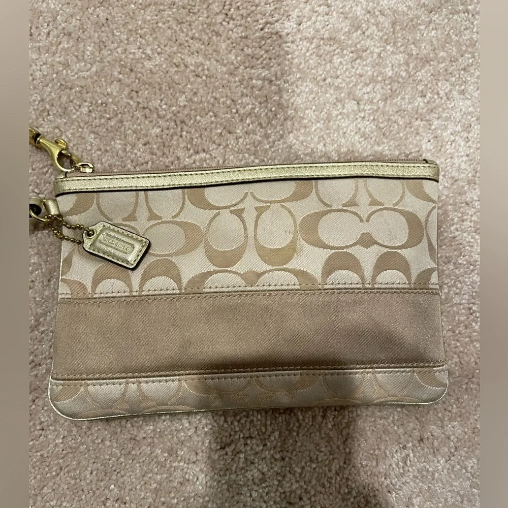 COACH Oversized Gold Wristlet - Picture 2 of 6